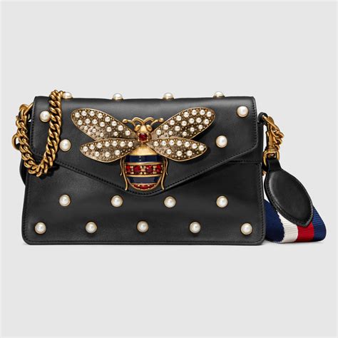 gucci bumble bee clutch|Gucci clutch for sale.